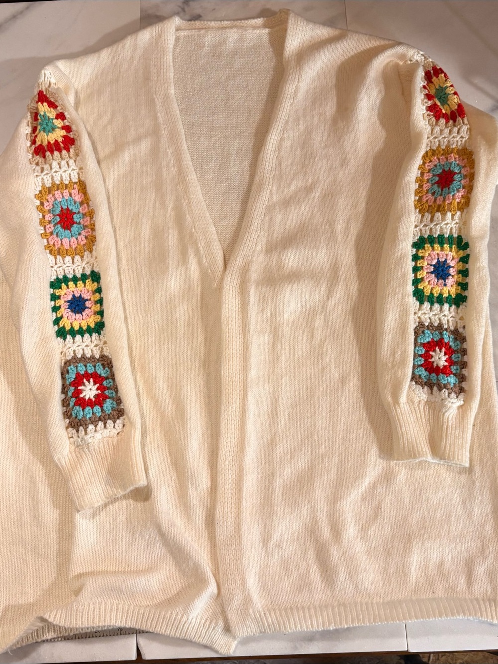 Cream V‑Neck Cardigan with Multicolor Crochet-Square Sleeves